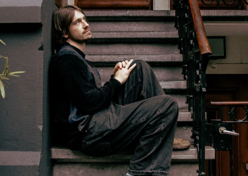 Citizen Papes sat on the stairs x